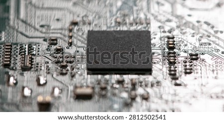 Circuit board with chip and microchip. Circuit board in integrated circuit. Circuit board for electronic computing. Circuitboard as abstract background.
