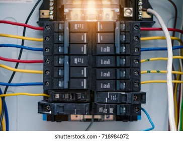 Circuit Board Connection.Electric System In Cabinet Building System.The Circuit New Breakers In Control Box.Electrical Control Panel In The Office Building.