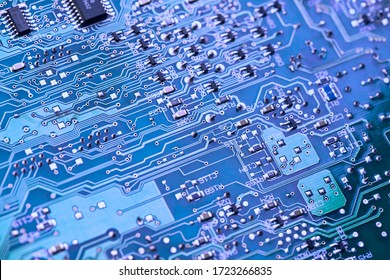 Circuit board. Electronic computer hardware technology. Motherboard digital chip. Tech science background. Integrated communication processor. Information engineering component. Blue color.