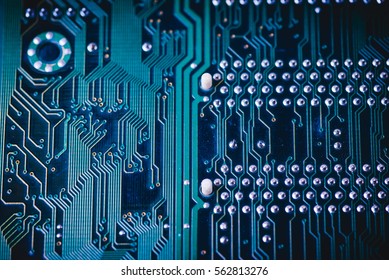 Circuit board. Electronic computer hardware technology. Motherboard digital chip. Tech science background. Integrated communication processor. Information engineering component. Blue, green color.
