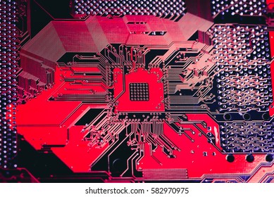 Circuit board. Electronic computer hardware technology. Motherboard digital chip. Tech science background. Integrated communication processor. Information engineering component. Blue, red color.
