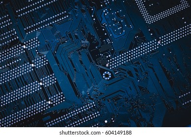 Circuit board. Electronic computer hardware technology. Motherboard digital chip. Tech science background. Integrated communication processor. Information engineering component. Blue, green color.
