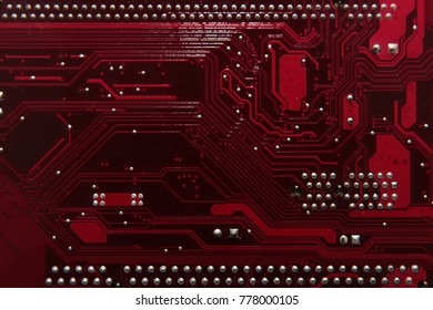Circuit board. Electronic computer hardware technology. Motherboard digital chip. Tech science background. Integrated communication processor. Information engineering component. Red color.