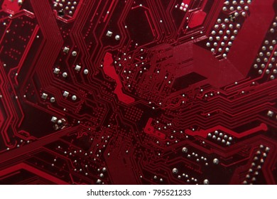 Circuit board. Electronic computer hardware technology. Motherboard digital chip. Tech science background. Integrated communication processor. Information engineering component. Red color.