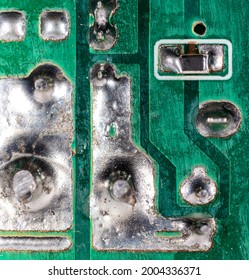 Circuit board with microcircuits as a background. Close-up