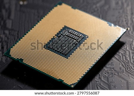 Circuit board with processor on electronic surface. Circuit board in macro background with processor chip. Circuitboard for computing data with processor. Digital texture with processor chip.
