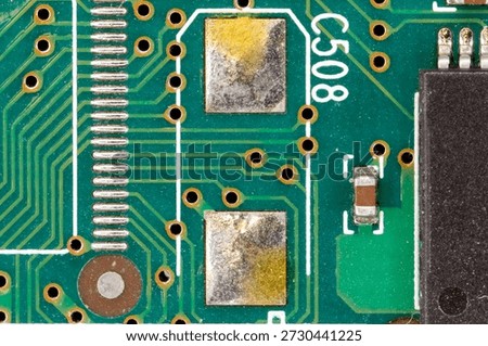 Circuits and electronic components on a green printed circuit board
