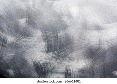 Circular brushed metal background