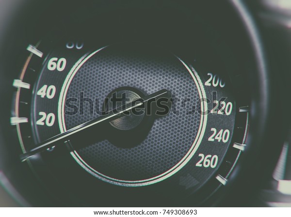 Circular car speedometer with indicator and\
numbers. Vehicle tachometer with analog\
dial