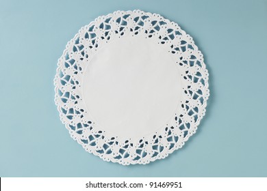 Circular Doily On Glass Table