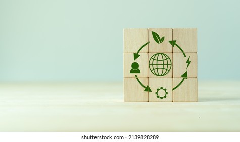 Circular economy concept, recycle, environment, reuse, manufacturing, waste, consumer, resources. LCA Life cycle assessment. Sustainability Wooden cubes; symbol of circular economy on grey background. - Shutterstock ID 2139828289