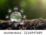 Circular economy concept.crystal globe with a circular economy icon around it.circular economy for future growth of business and design to reuse and renewable material resources.

 









 