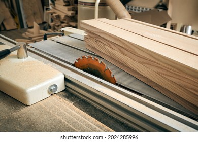 Circular Electric Saw And Finished Boards, In A Carpenter's Workshop.