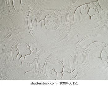 Circular pattern textured ceiling decor commonly known as Artex.