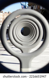 Circular Pattern In Tube Formation With Blurred Foreground On City Street