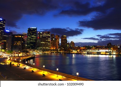 Circular Quay With Sydney City Skyline At Night With Clouds And Lights