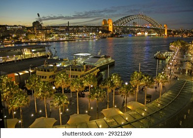 Circular Quay In Sydney, Night Photo, Harbour Bridge In Background