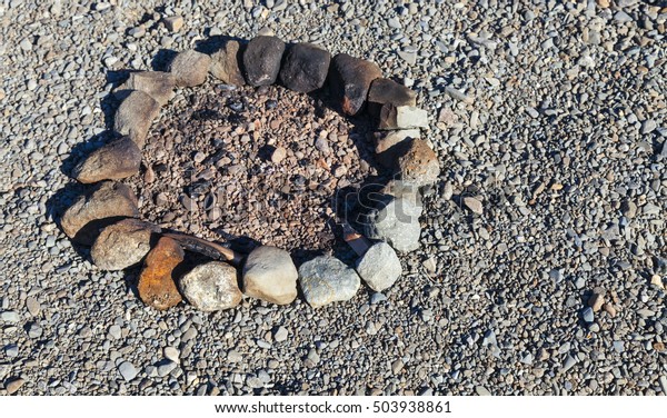 Circular Stone Fire Pit On Pebble Royalty Free Stock Image