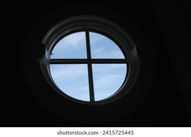 Circular window and blue sky
