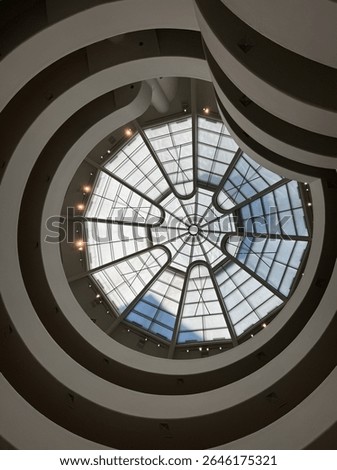 Circular window with pattern and a golden spiral in the Guggenheim 