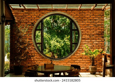 a circular window in a section of wall