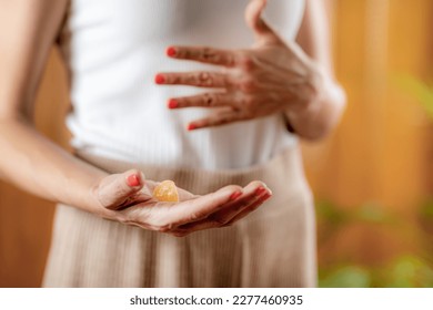 Circulation of energy within the chakras using crystals. Chakras, energy centers in the body, govern certain physical, emotional and spiritual functions.  