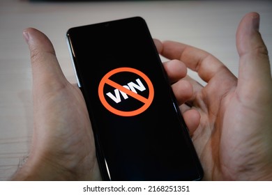 circumvention of sanctions is a concept. Ban on the use of VPN on a smartphone. - Shutterstock ID 2168251351