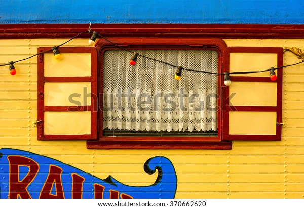 Circus wagon close-up / Caravan / Window on wooden house\
    