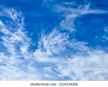 Cirius clouds background white on blue