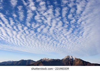 Cirrocumulus Clouds In Blue Sky