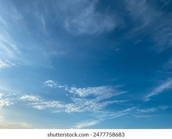 Cirrocumulus clouds and clear blue sky background with soft sunlight, Altocomulus - Powered by Shutterstock