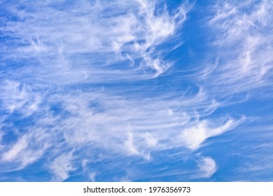 
Cirrostratus Clouds In The Blue Sky