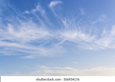 Cirrus Clouds In Blue Sky