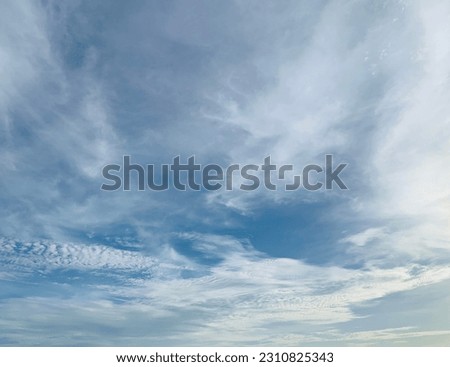Cirrus clouds fluttering in the wind When the air pressure is high Clouds move up and down like waves beautiful sky at Bangkok,Thailand. no focus