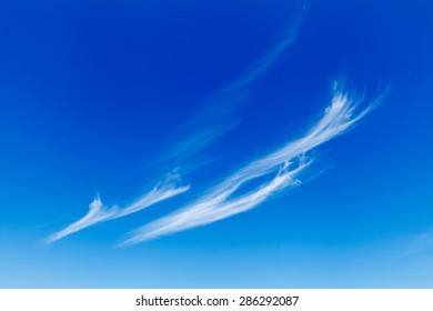 Cirrus Clouds On Blue Sky