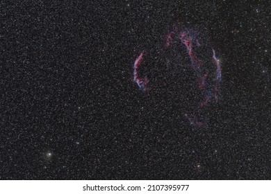 Cirrus Nebula in the constellation of Cygnus on the night sky
