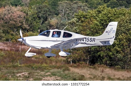 Cirrus SR22 Single Engine Private Propeller Small Plane Landing, Beverly Airport Massachusetts USA, September 23, 2007