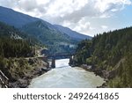 Cisco crossing, Canada - 22nd June 2023:The Rocky Mountainee Railway approaching Cisco Crossing