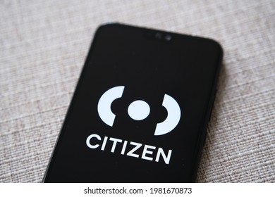 Citizen App Login Screen Seen On Smartphone Placed On Textured Surface. Citizen App Is A Service For Real-time Crime Alerts. Selective Focus. Stafford, United Kingdom, May 27, 2021.