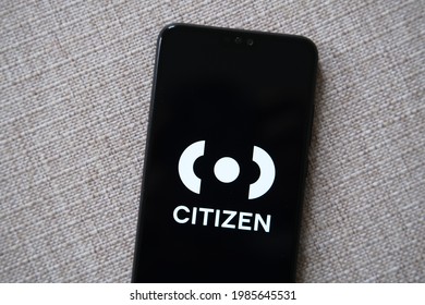 Citizen App Login Screen Seen On Smartphone Placed On Textured Surface. Citizen App Is A Service For Real-time Crime Alerts. Selective Focus. Stafford, United Kingdom, May 27, 2021.