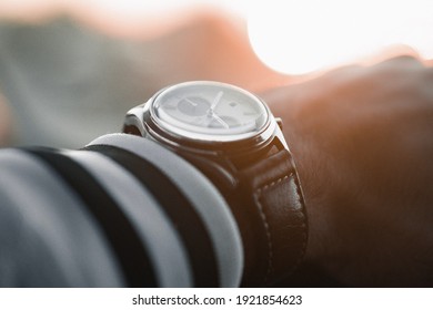 Citizen Watch On Man's Wrist While Driving.