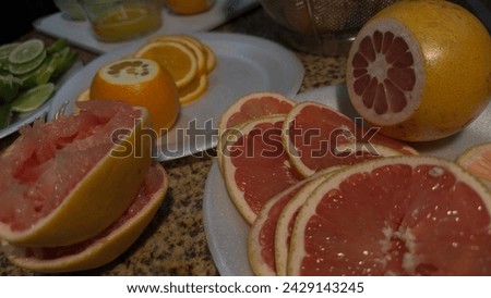 Citrus Elegance: Artfully Arranged Oranges, Grapefruits, and Lemons with Fresh Juice