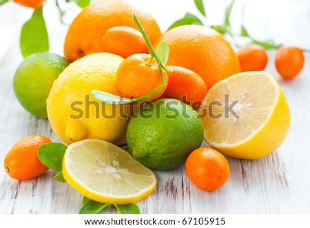 Citrus fresh fruit on the white wooden table