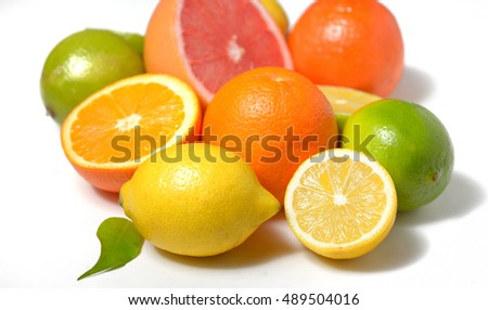 citrus fruit with leaves on white background

