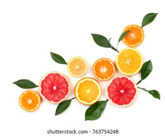 Citrus fruits isolated on white background. Isolated citrus fruits. Pieces of lemon, pink grapefruit and orange isolated on white background, with clipping path. Top view - Shutterstock ID 763754248