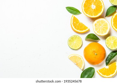 Citrus Fruits At White Background.