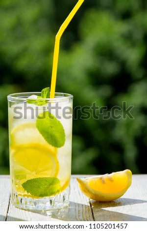 Similar – Infused fruit water cocktails and woman drinking green smoothie