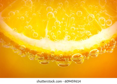 Citrus orange slice with air bubbles