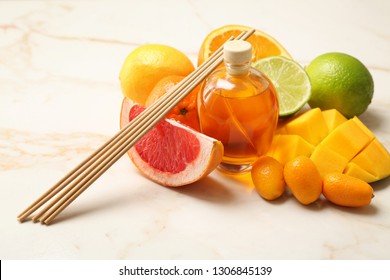 Citrus reed diffuser on table