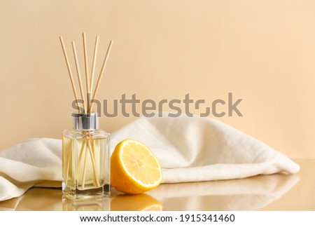 Citrus reed diffuser on table